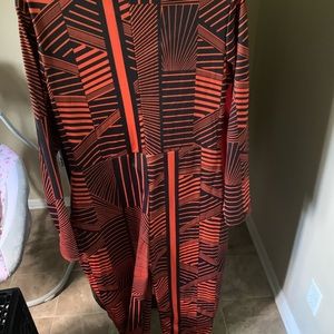 Orange and black one piece body suit